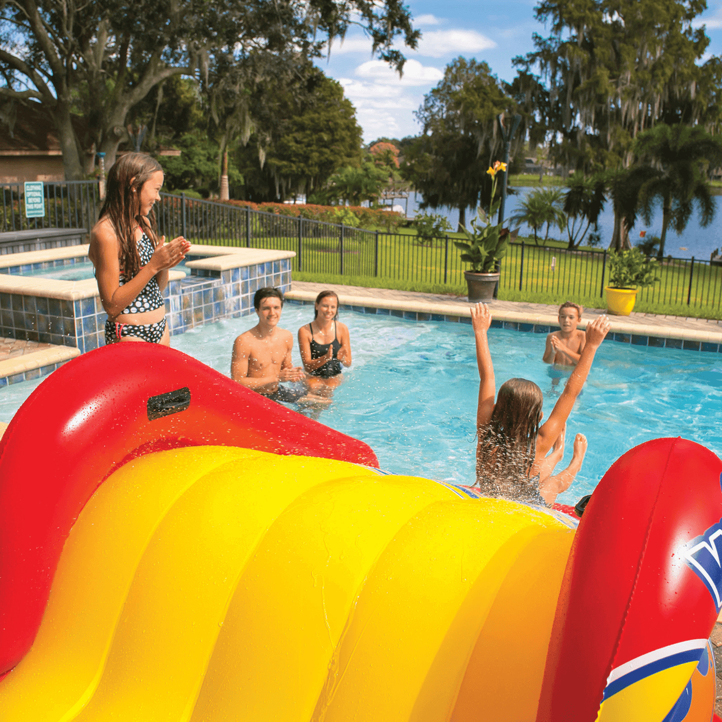 WOW Watersports Slide N Smile Inflatable Pool Slide with Sprinklers