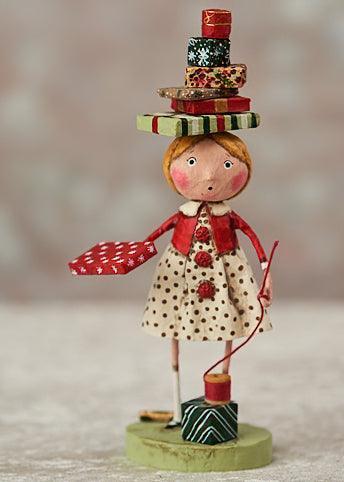 Wrappings and Ribbons Holiday Figurine by Lori Mitchell